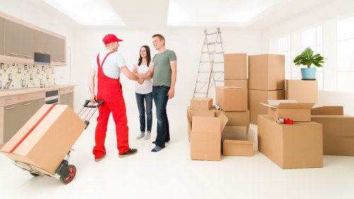 Packed boxes and furniture ready for transport in Docklands