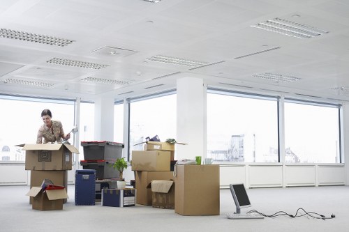 Professional movers handling furniture in a Docklands flat move