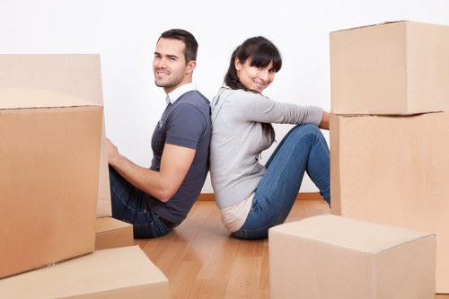 Packed boxes and furniture ready for a Docklands move