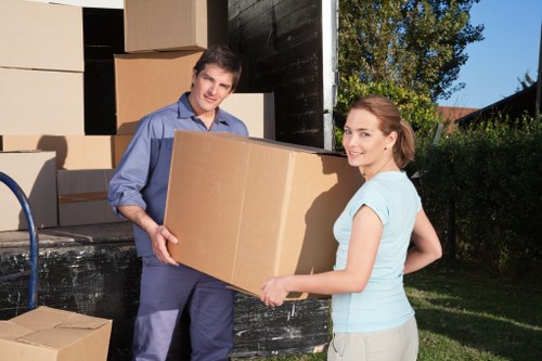 Local removals team preparing furniture for transport in Docklands